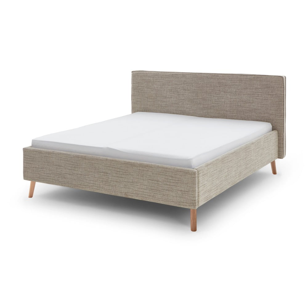 Bézs kárpitozott franciaágy tárolóhellyel